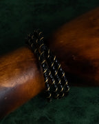 "MAISON MARGIELA" Twisted cord design brass bangle