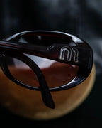 "Miu Miu" reddish brown sporty sunglasses