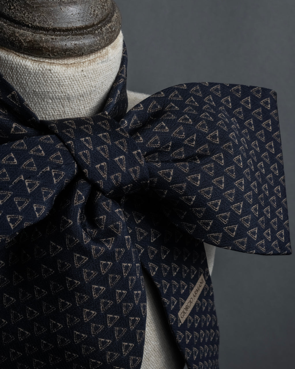 "ARMANI COLLEZIONI" Repeated triangle motif silk neck tie