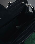 "Y’s" 22AW sculptural kiss-lock leather bag