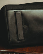 “PRADA” 90’s-00’s Nylon and leather flap messenger bag
