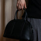 "MORABITO" Half moon design grained leather handbag