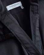 "Yves Saint Laurent Rive Gauche"
Twisted front sleeveless shirt