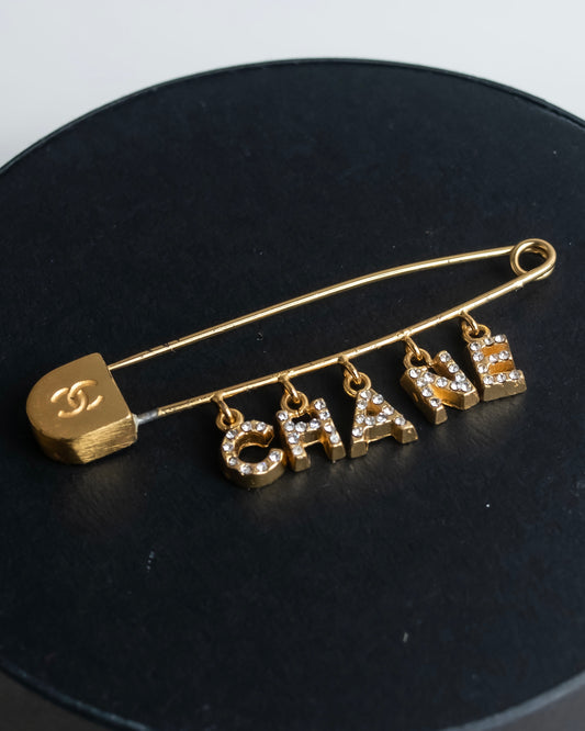 "CHANEL" Logo motif gold safety pin brooch