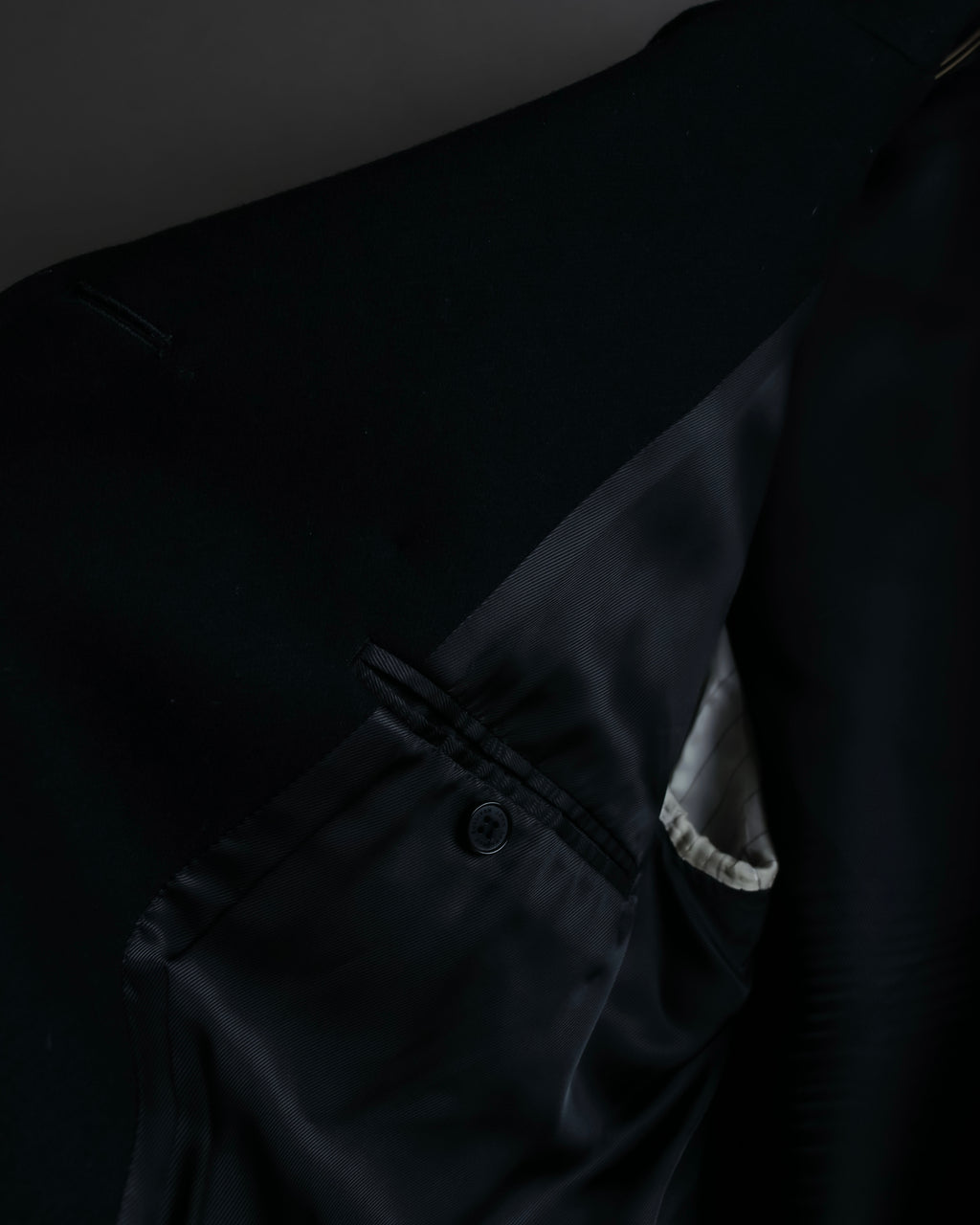 "JOHN LAWRENCE SULLIVAN"
 Large lapel double-breasted mid length coat