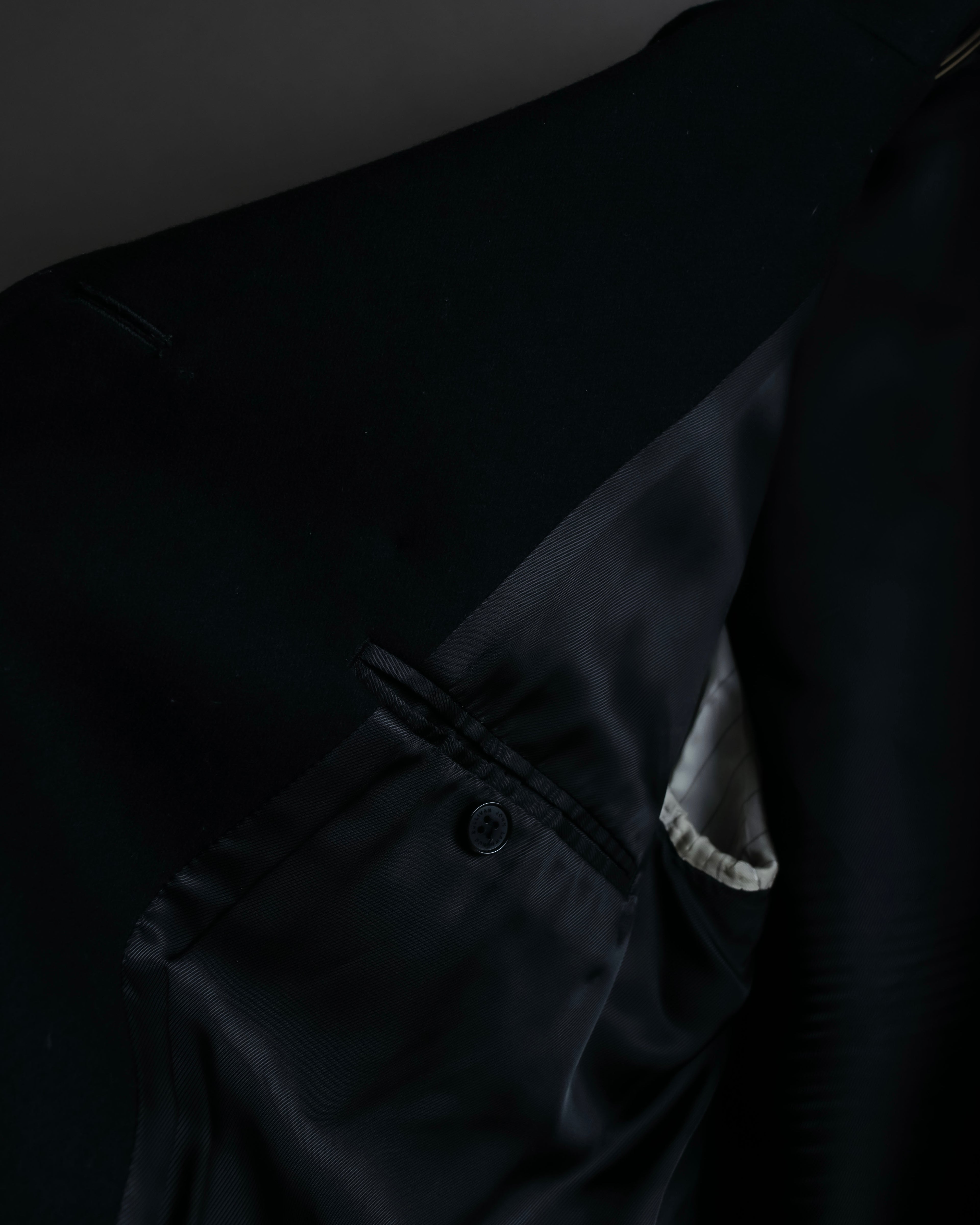 "JOHN LAWRENCE SULLIVAN"
 Large lapel double-breasted mid length coat