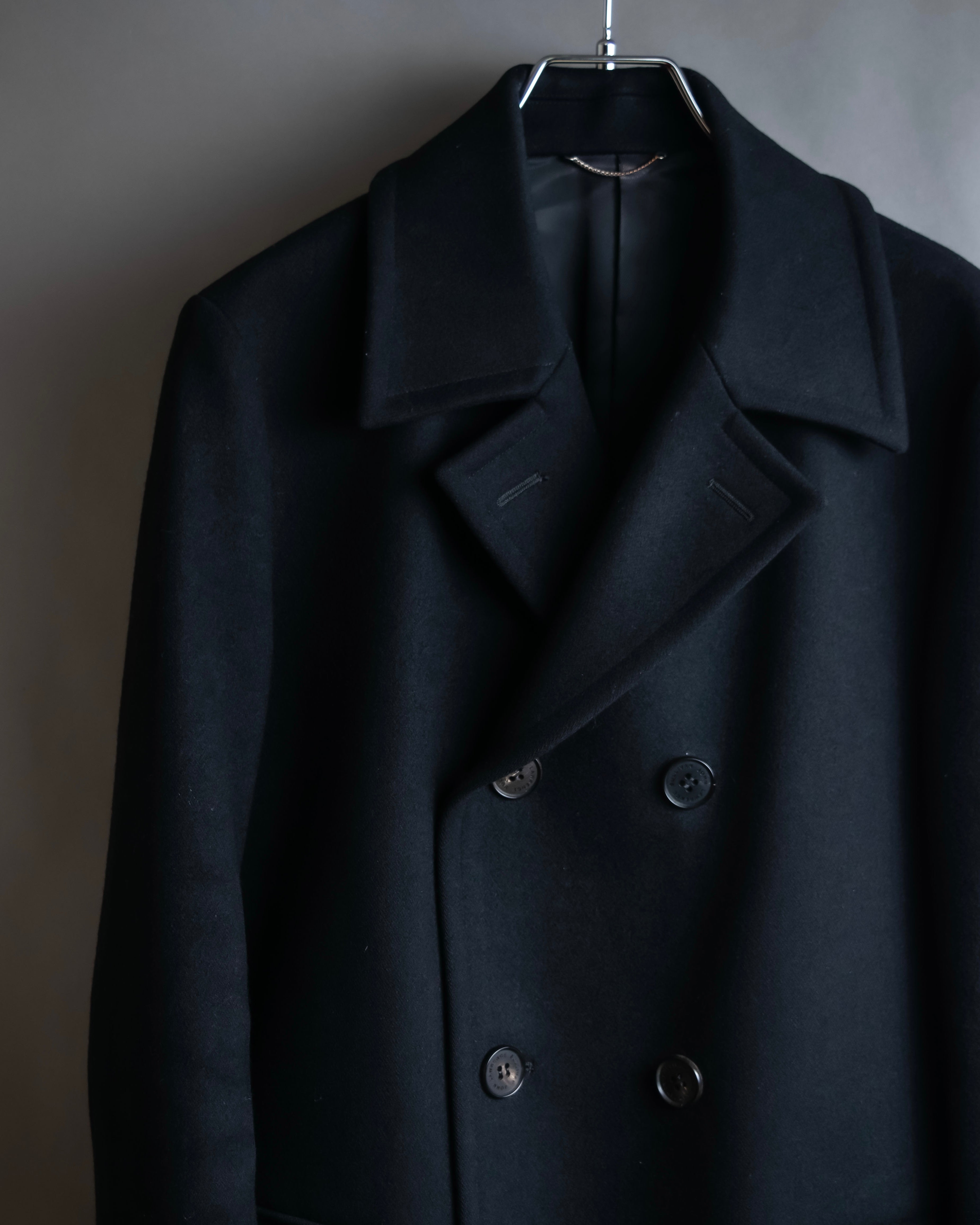 "JOHN LAWRENCE SULLIVAN"
 Large lapel double-breasted mid length coat