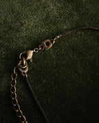 “Christian Dior” 90’s-00’s Antique gold botanical pendant necklace