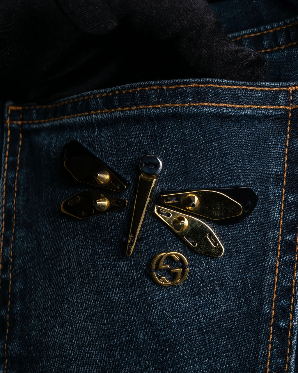 Pantalones de mezclilla con lavado de libélula de GUCCI