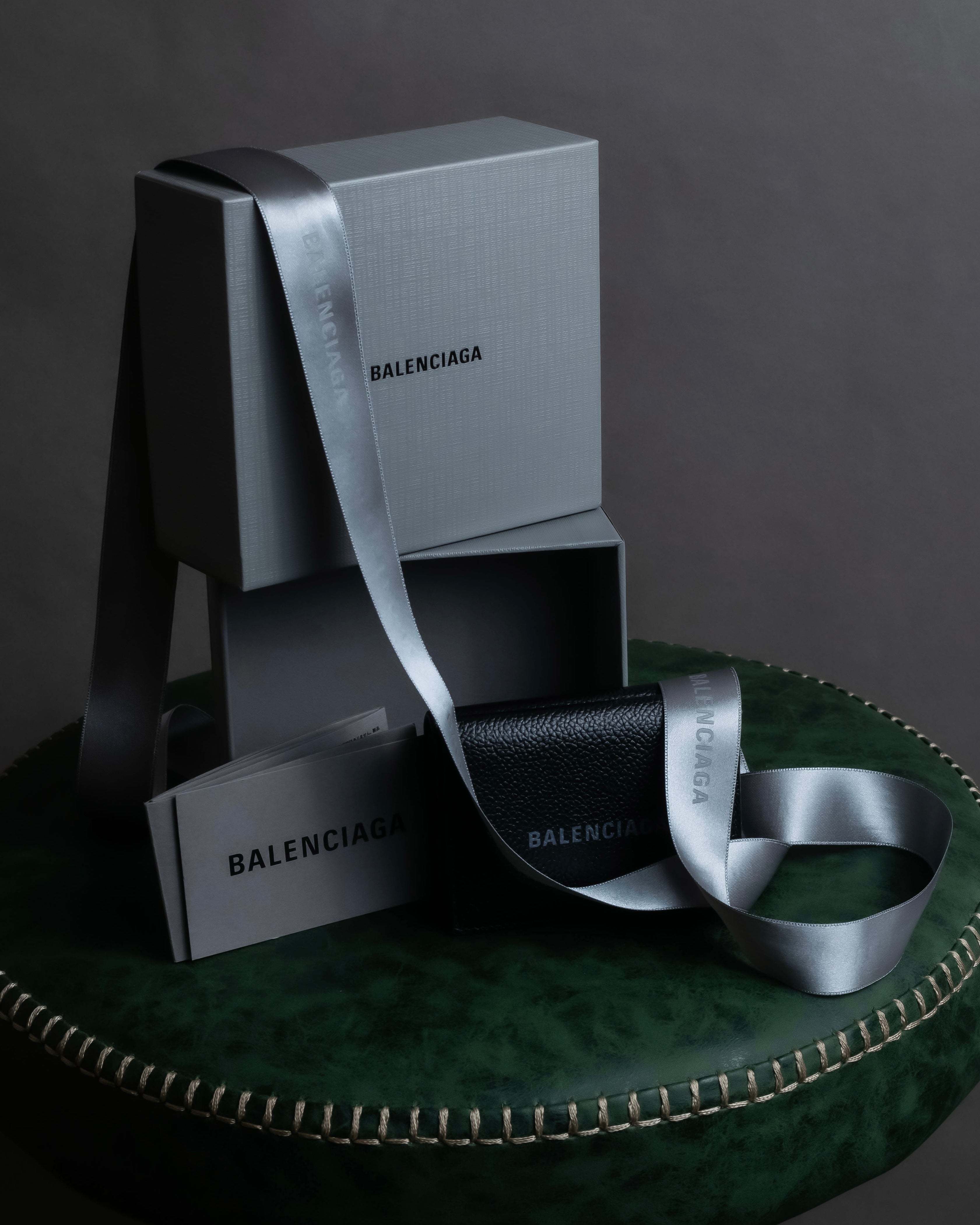 "BALENCIAGA" Logo engraved compact leather tri-fold wallet