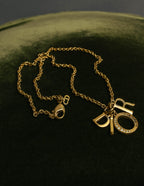 "Christian Dior" 90's-00's Gold tone logo charm necklace