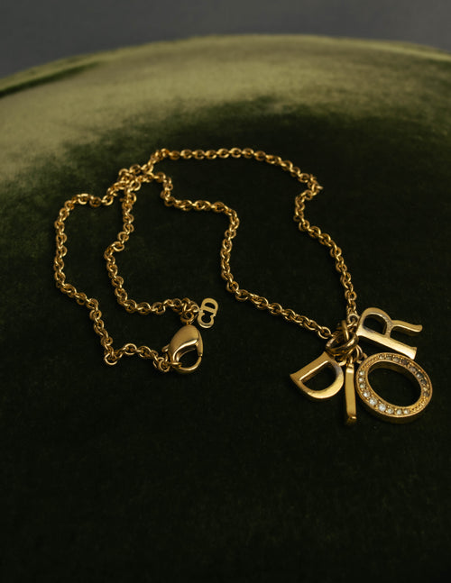 "Christian Dior" 90's-00's Gold tone logo charm necklace