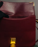 “Cartier” 80’s-90’s Must de Cartier burgundy leather shoulder bag