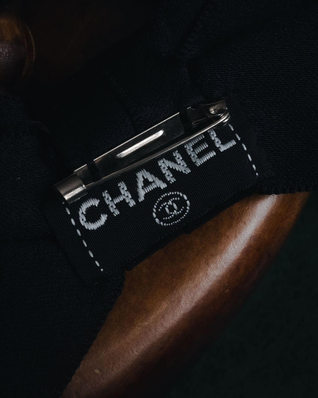 "CHANEL" 90’s black satin and grosgrain ribbon brooch