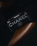 "CHANEL" 90’s black satin and grosgrain ribbon brooch