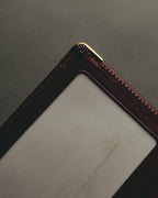 “Cartier” 90’s Must de Cartier burgundy embossed leather bifold wallet