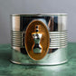 "JEAN PAUL GAULTIER" Torso motif solid perfume docking silver bangle