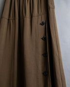 "ISSEY MIYAKE" Gathered waist detail button slide flared skirt