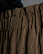 "ISSEY MIYAKE" Gathered waist detail button slide flared skirt