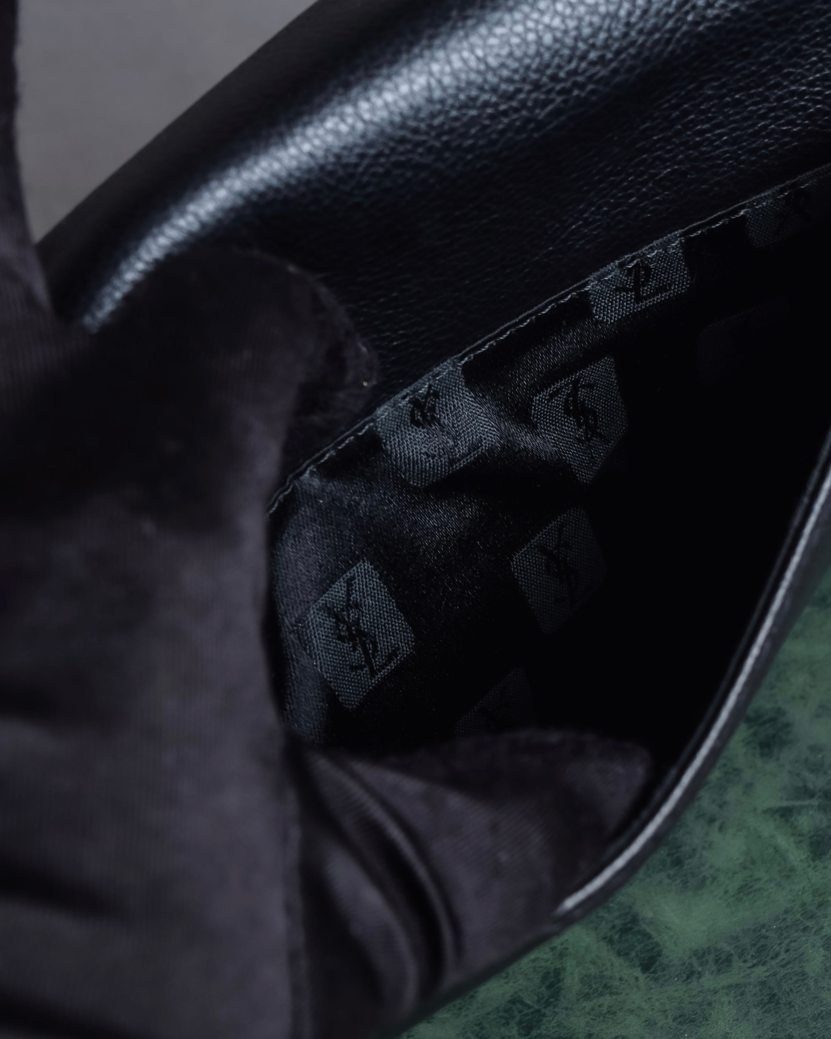 "YVES SAINT LAURENT" Hand stitched design trapezoid leather bag