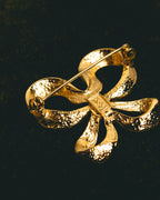 "Yves Saint Laurent" Sculptural gold bow brooch