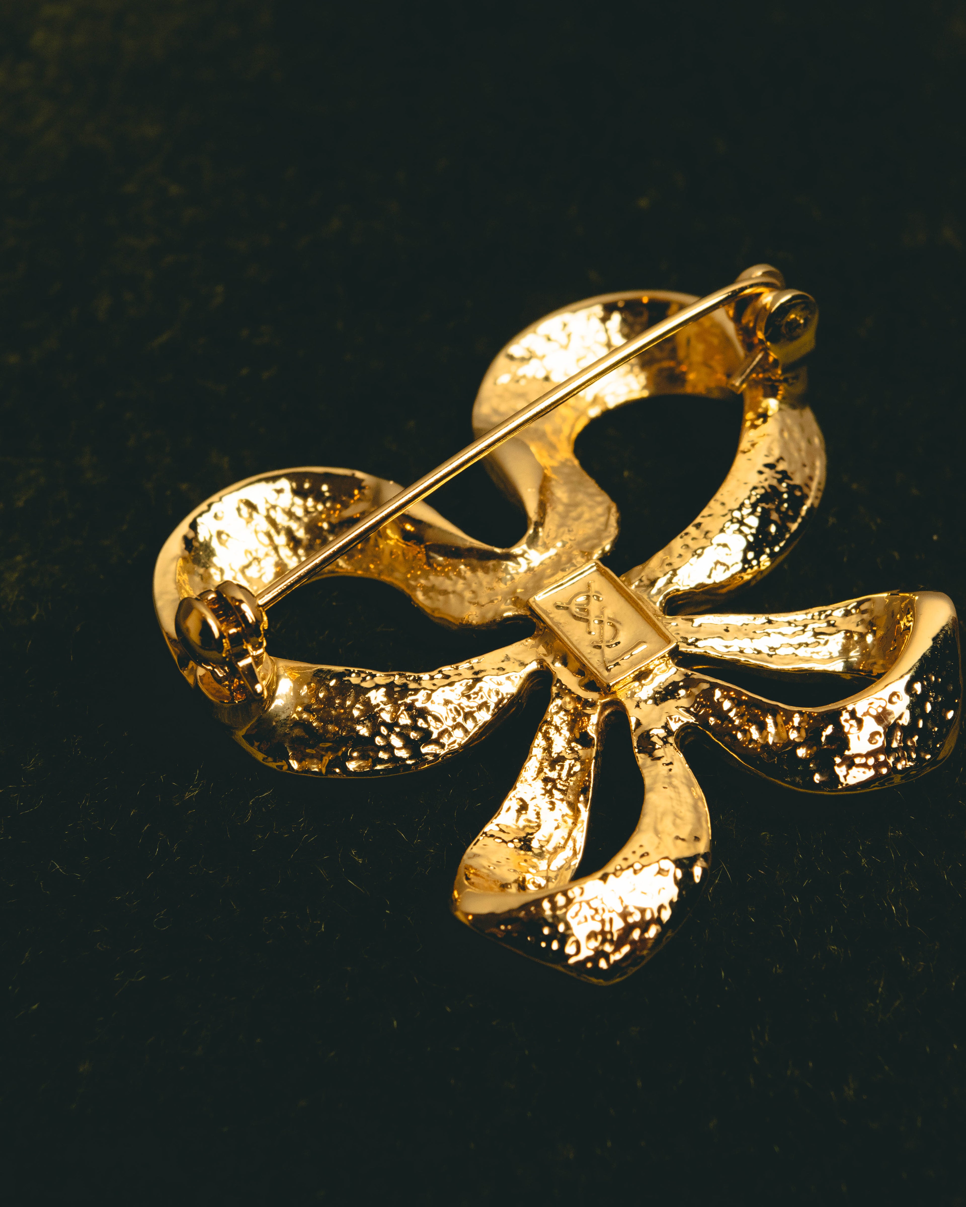 "Yves Saint Laurent" Sculptural gold bow brooch