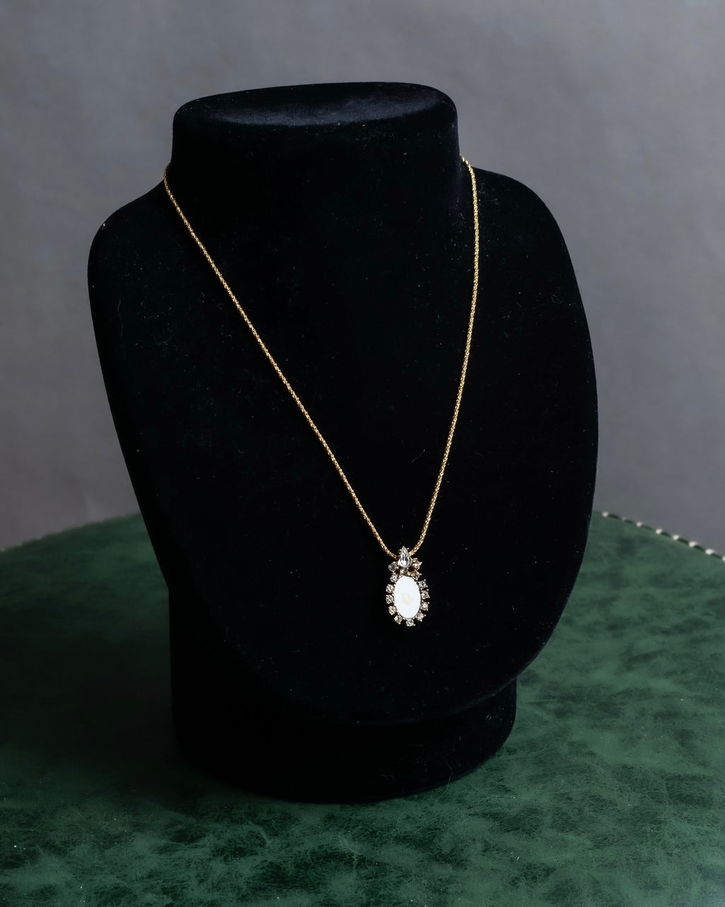 "Christian Dior" Trotter logo engraved gold pendan