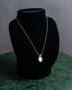 "Christian Dior" Trotter logo engraved gold pendan