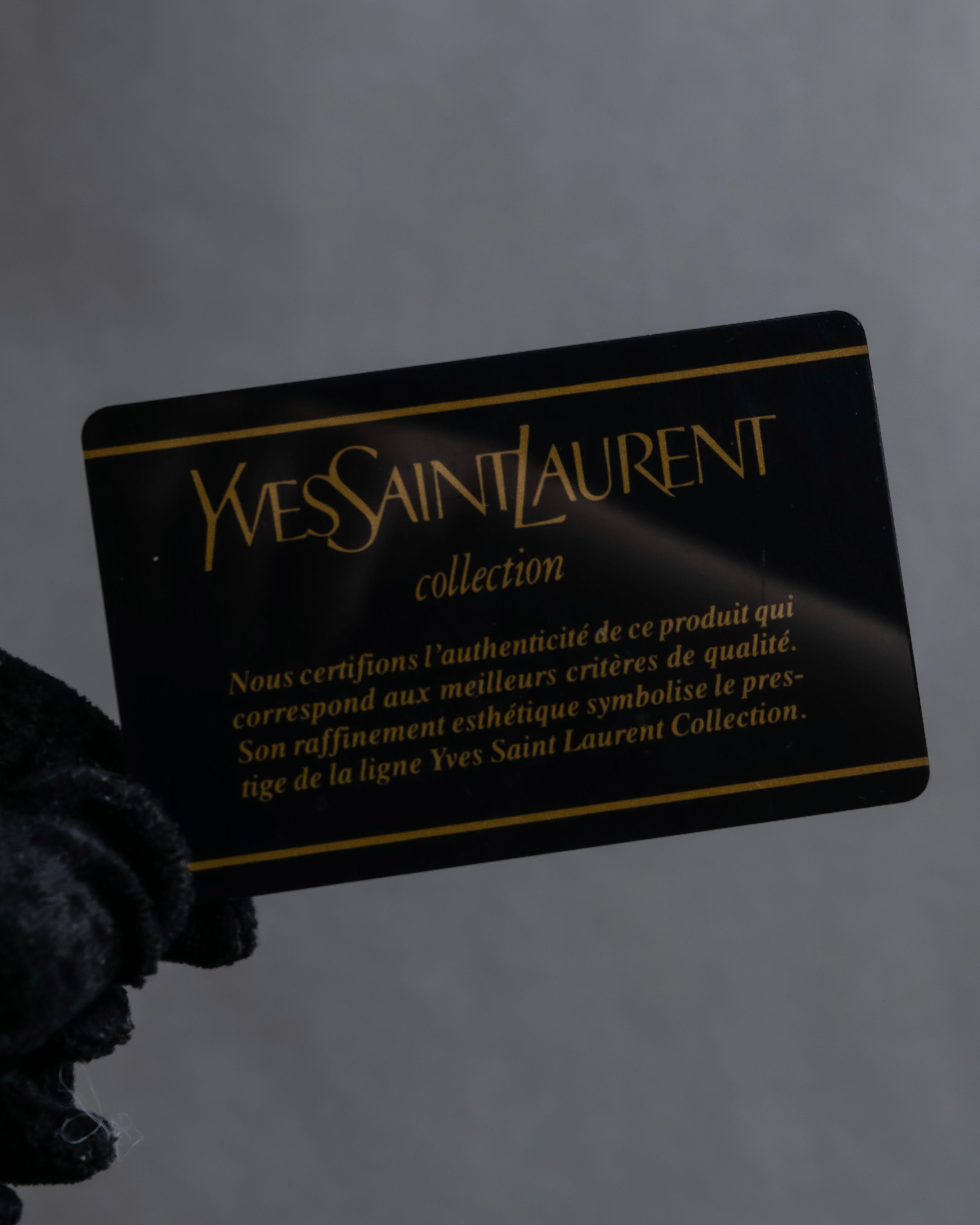 "YVES SAINT LAURENT" Cassandra logo engraved leather bi-fold wallet