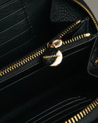 "Tiffany & Co." 10's-20's Embossed leather wristlet wallet