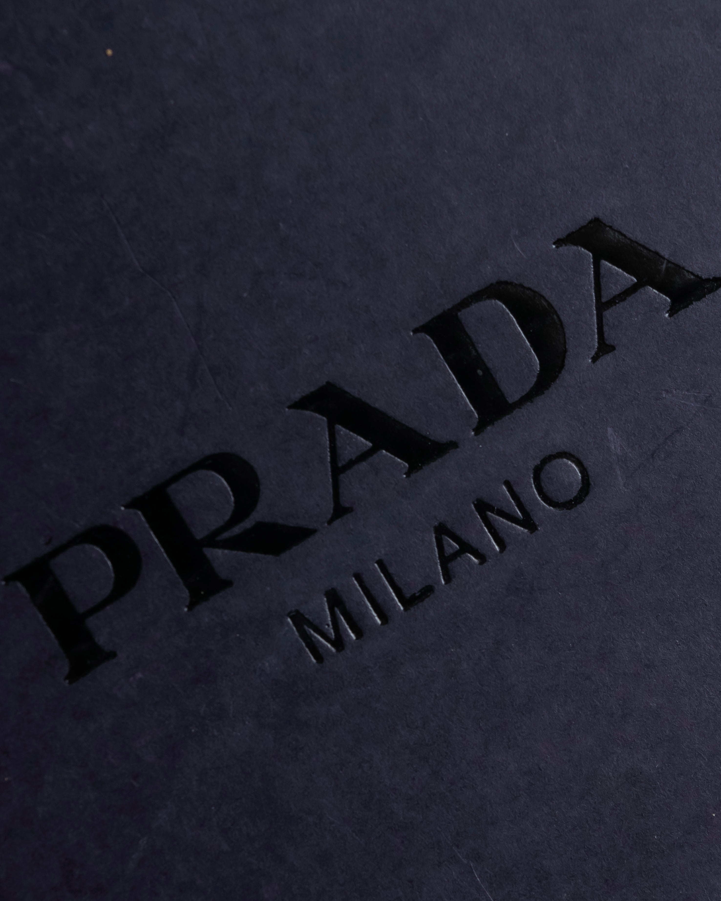 "PRADA" Metal band design leather heel loafers