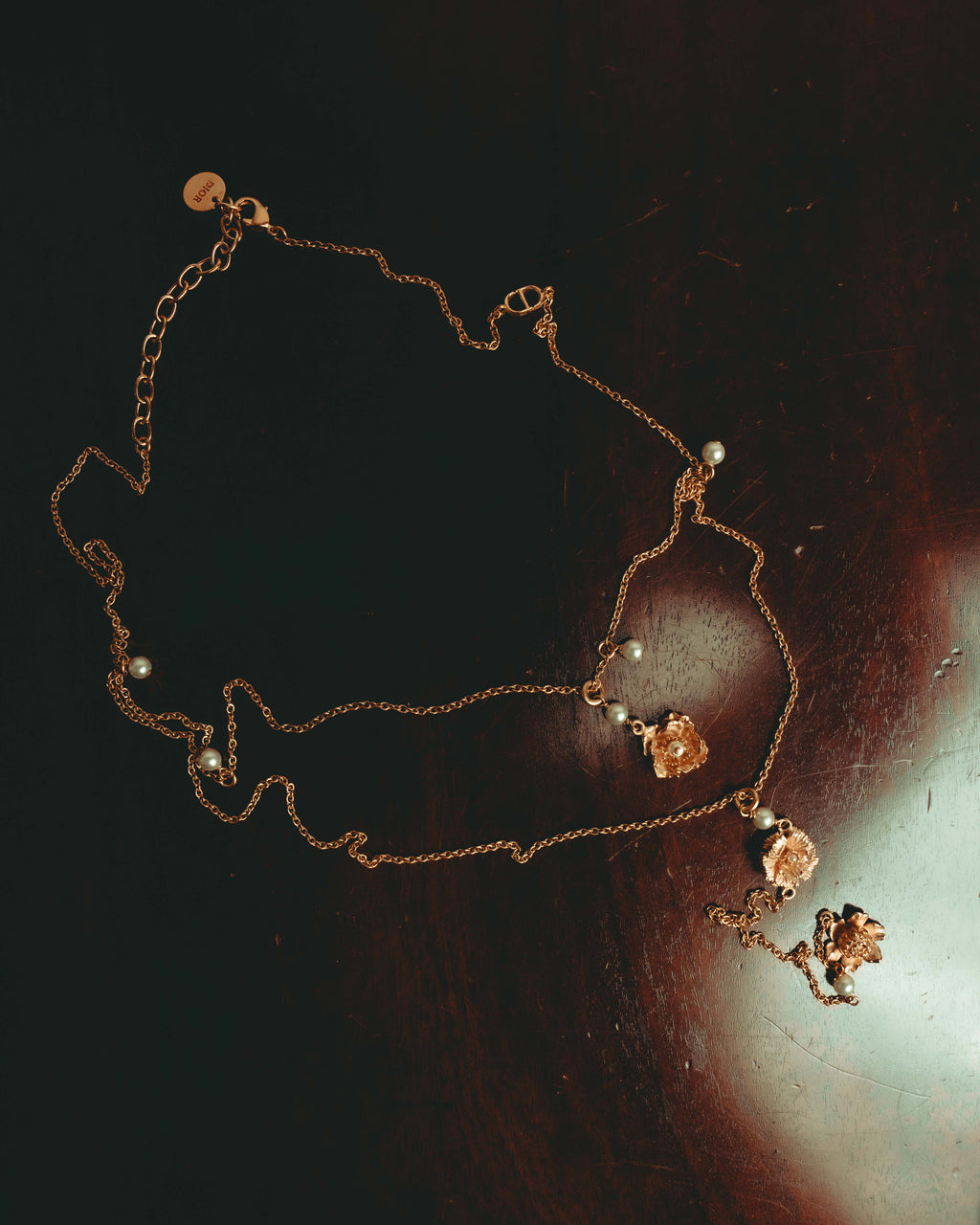 “Christian Dior” 2019-2025 Gold floral charm necklace with pearl accents