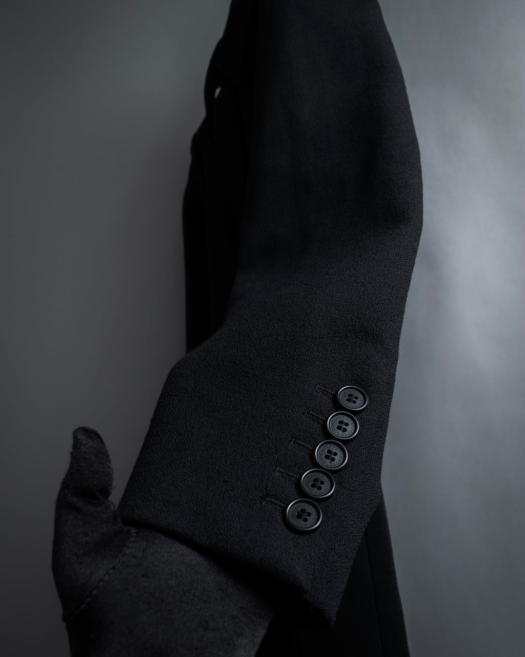 "GIANFRANCO FERRE" Multiple button sequences shaped long coat