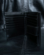 "GUCCI" Canvas and leather bi-fold wallet