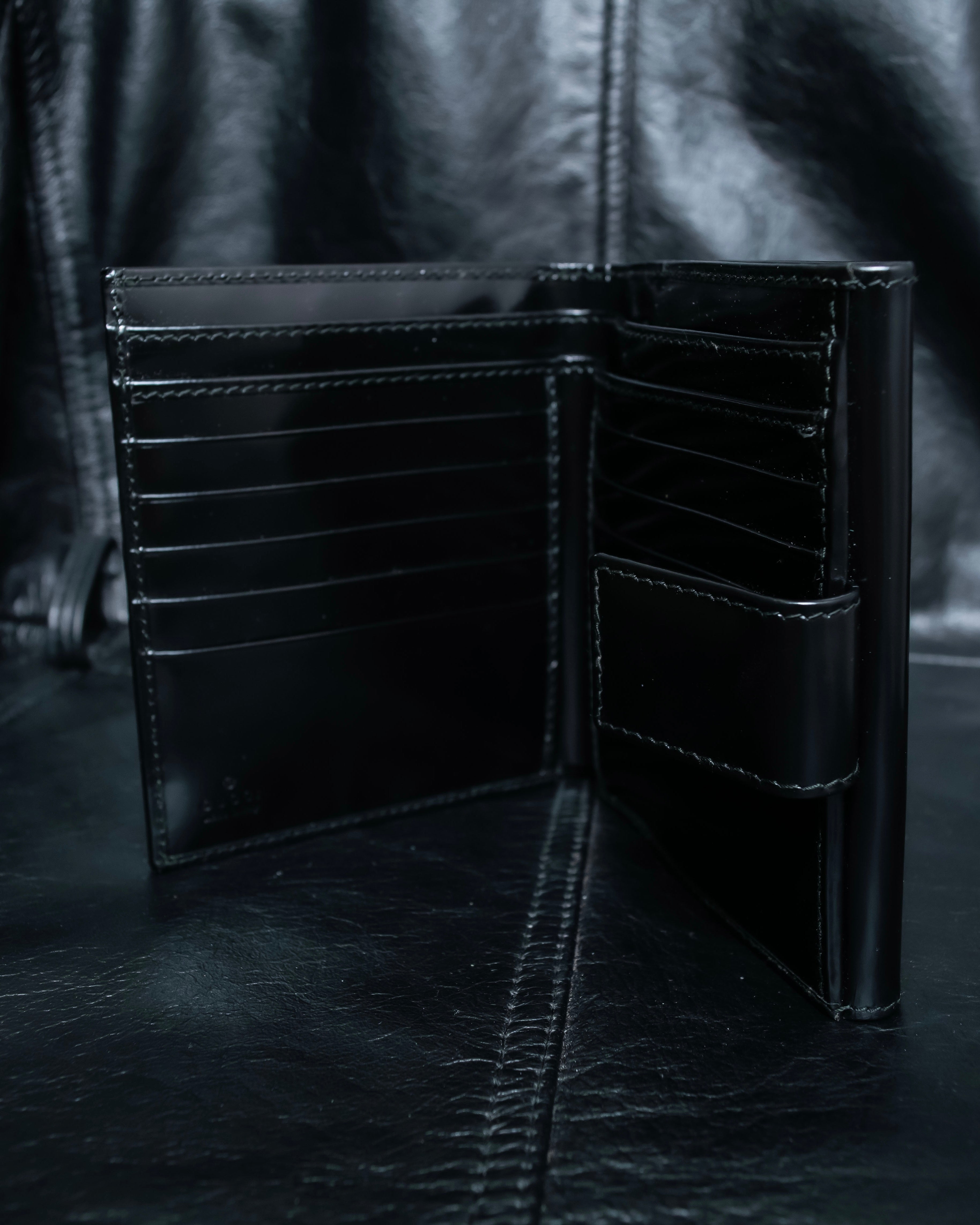 "GUCCI" Canvas and leather bi-fold wallet