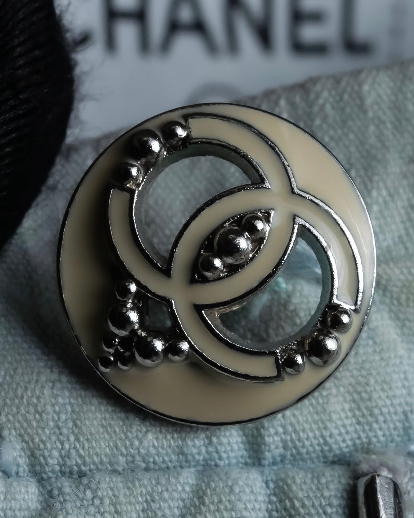 "CHANEL" Coco Mark button detail washed flared denim