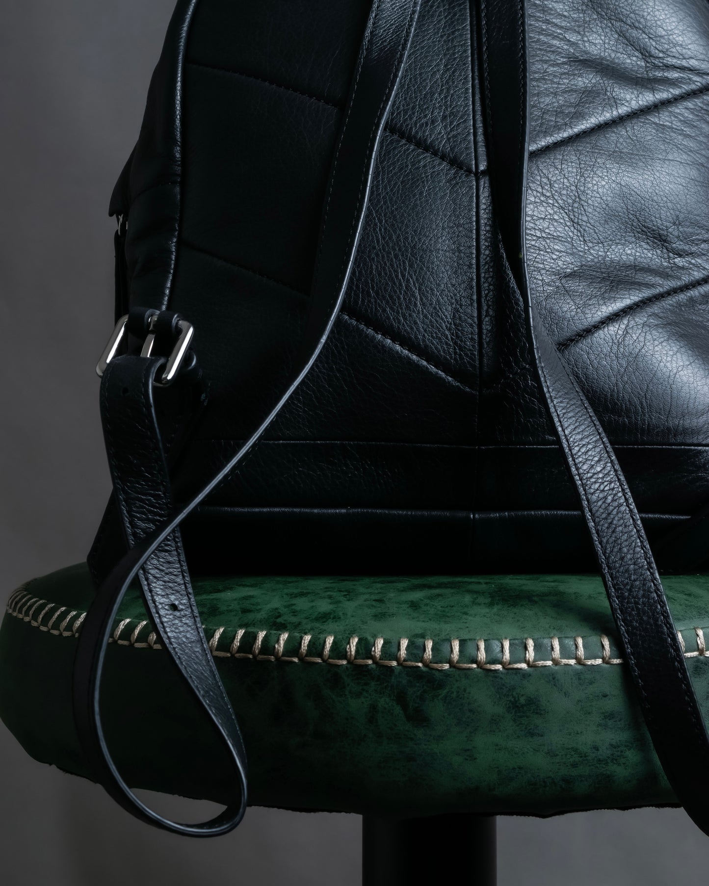 "DIESEL" Decorative zip design leather backpack