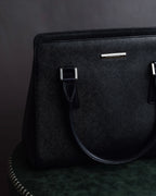 "BURBERRY" Trapezoidal embossed leather one-handle bag