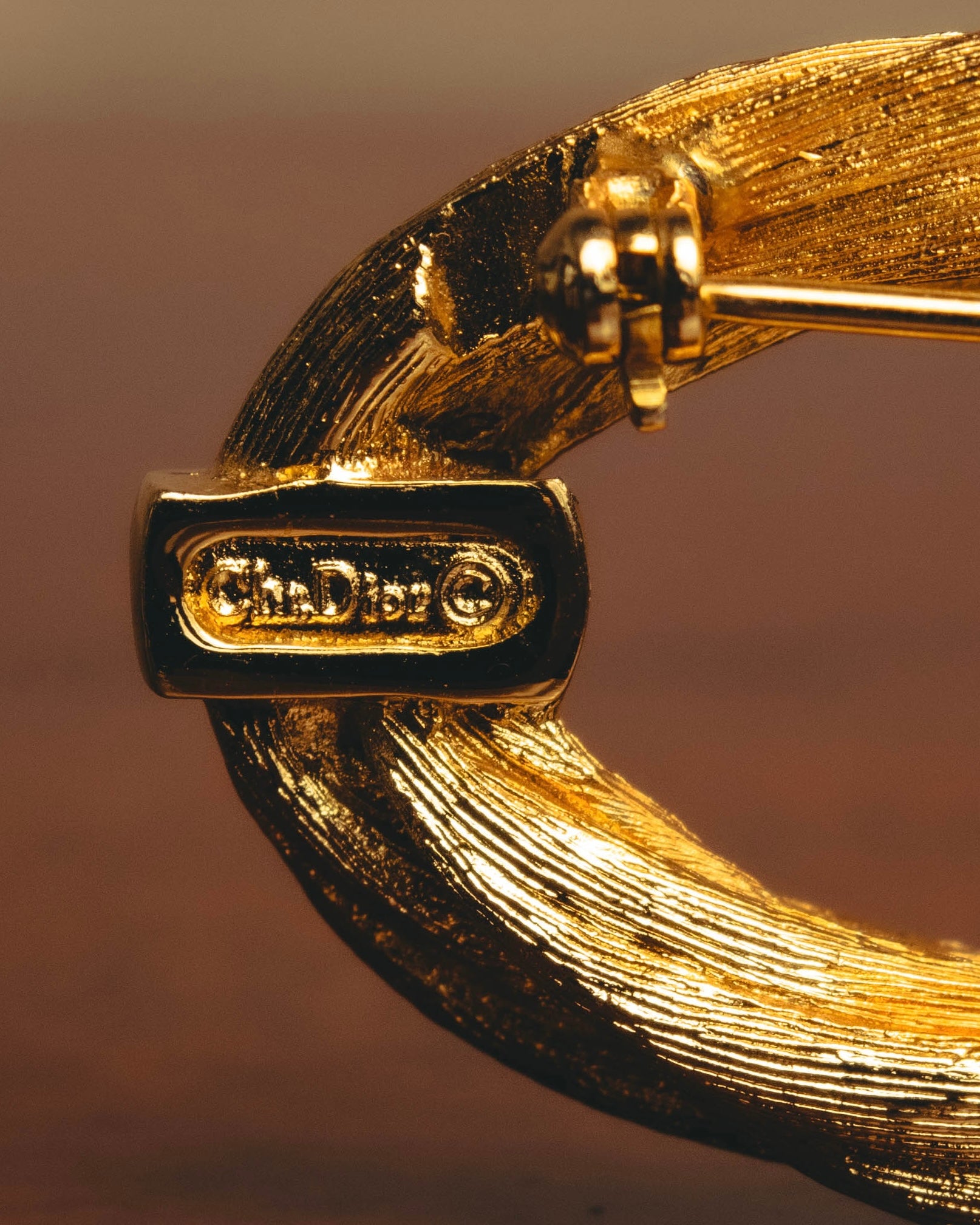 "Christian Dior" 70's Textured gold tone brooch