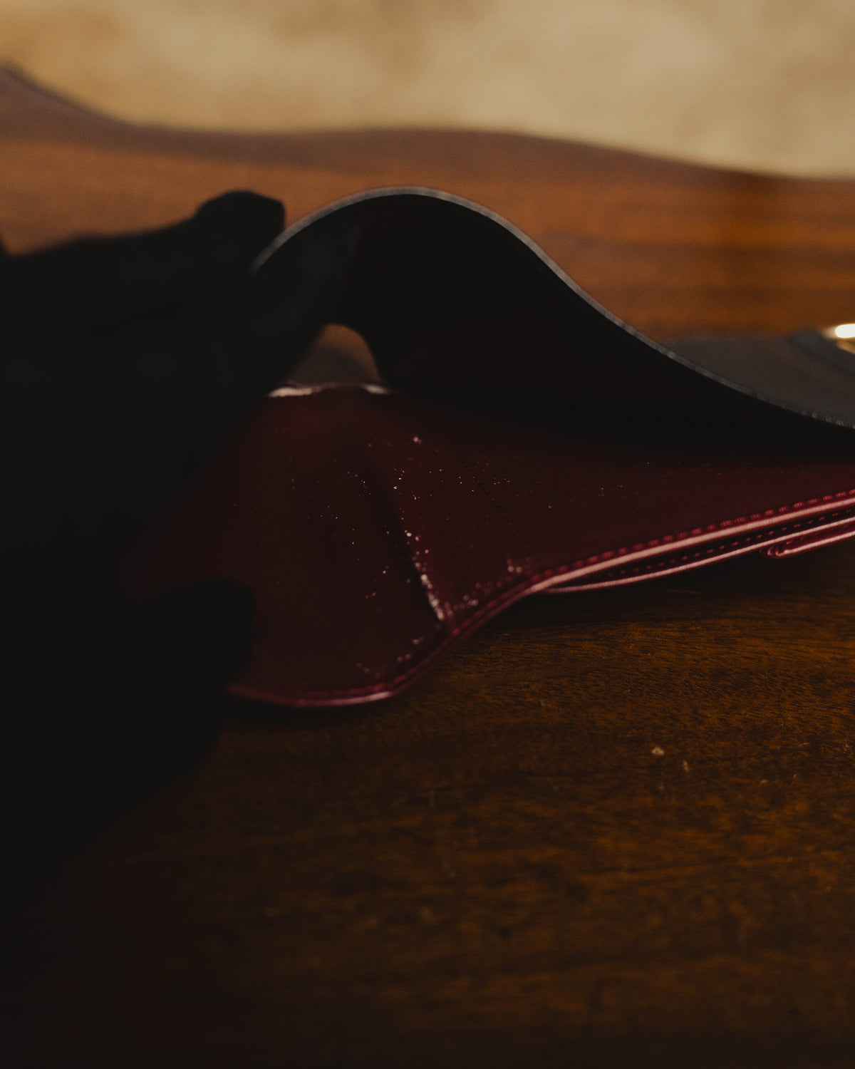 "Cartier" 80's Sculptural ring-handle leather wallet