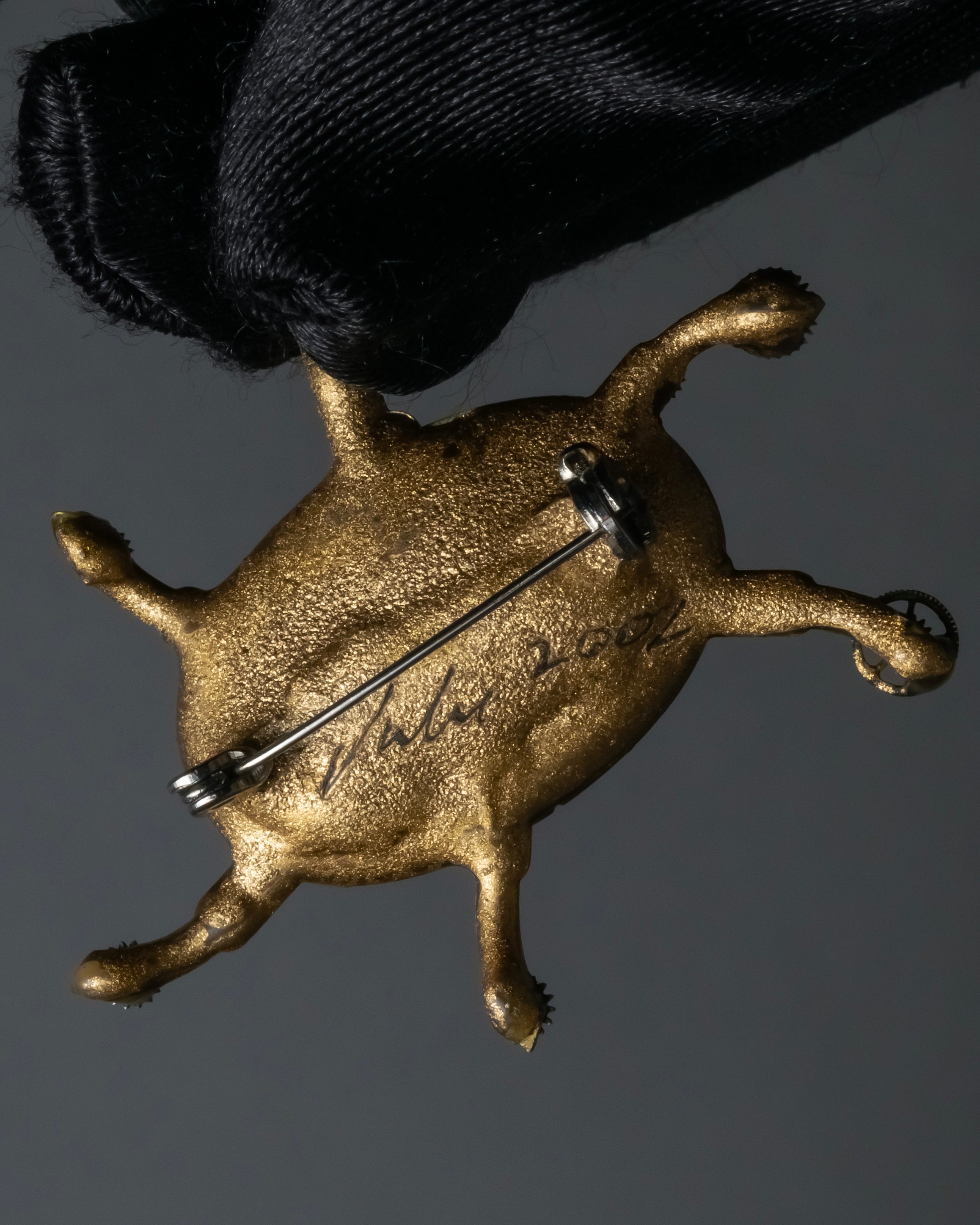 "Jerry Robertson design clock motif brooch"