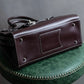 "HAMANO TOKYO" Trapezoidal shape iconic hardware leather one handle bag