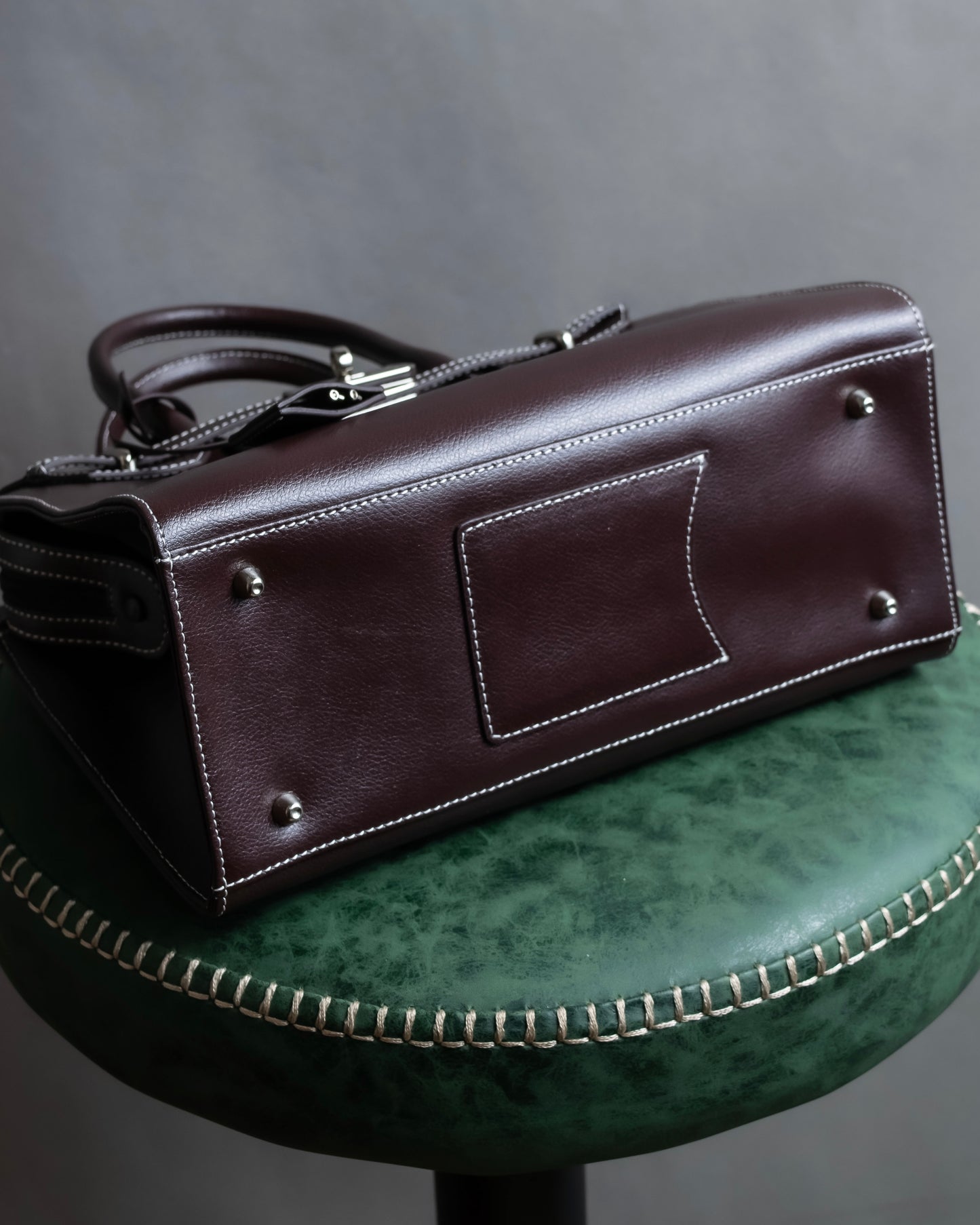 "HAMANO TOKYO" Trapezoidal shape iconic hardware leather one handle bag