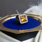 "GUCCI" Amber rhinestone GG motif engraved signet ring