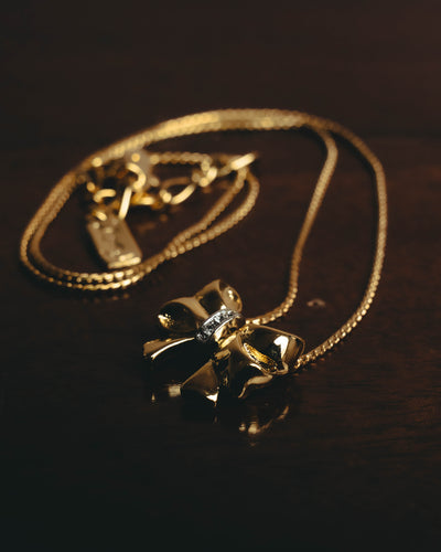"Yves Saint Laurent" 80's-00's Sculptural ribbon pendant necklace