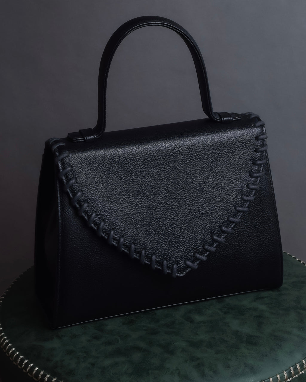 "YVES SAINT LAURENT" Hand stitched design trapezoid leather bag