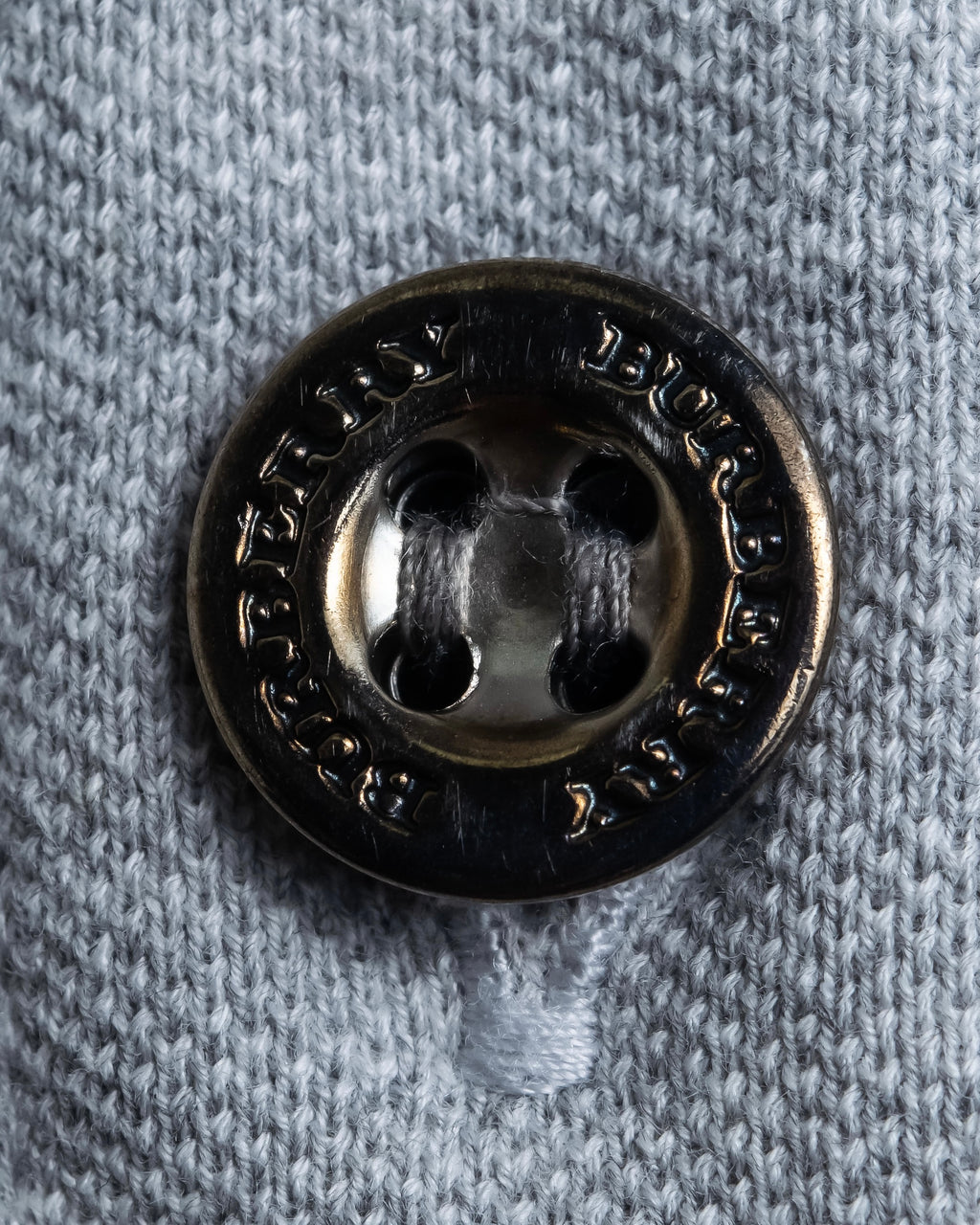 "BURBERRY" Knight logo engraved metal button polo shirt