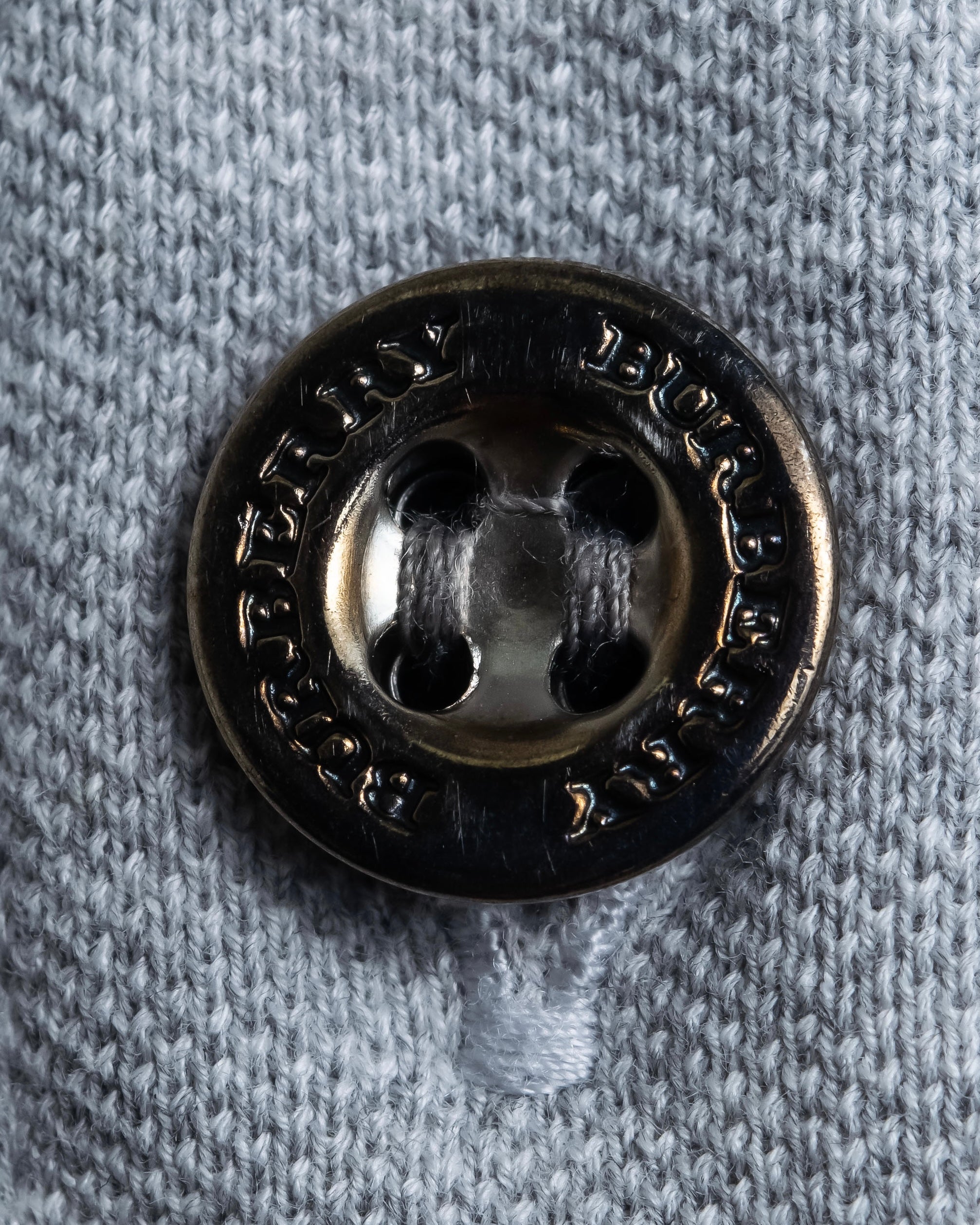 "BURBERRY" Knight logo engraved metal button polo shirt