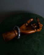 "Dolce & Gabbana" Curved rivet design silver metal bracelet