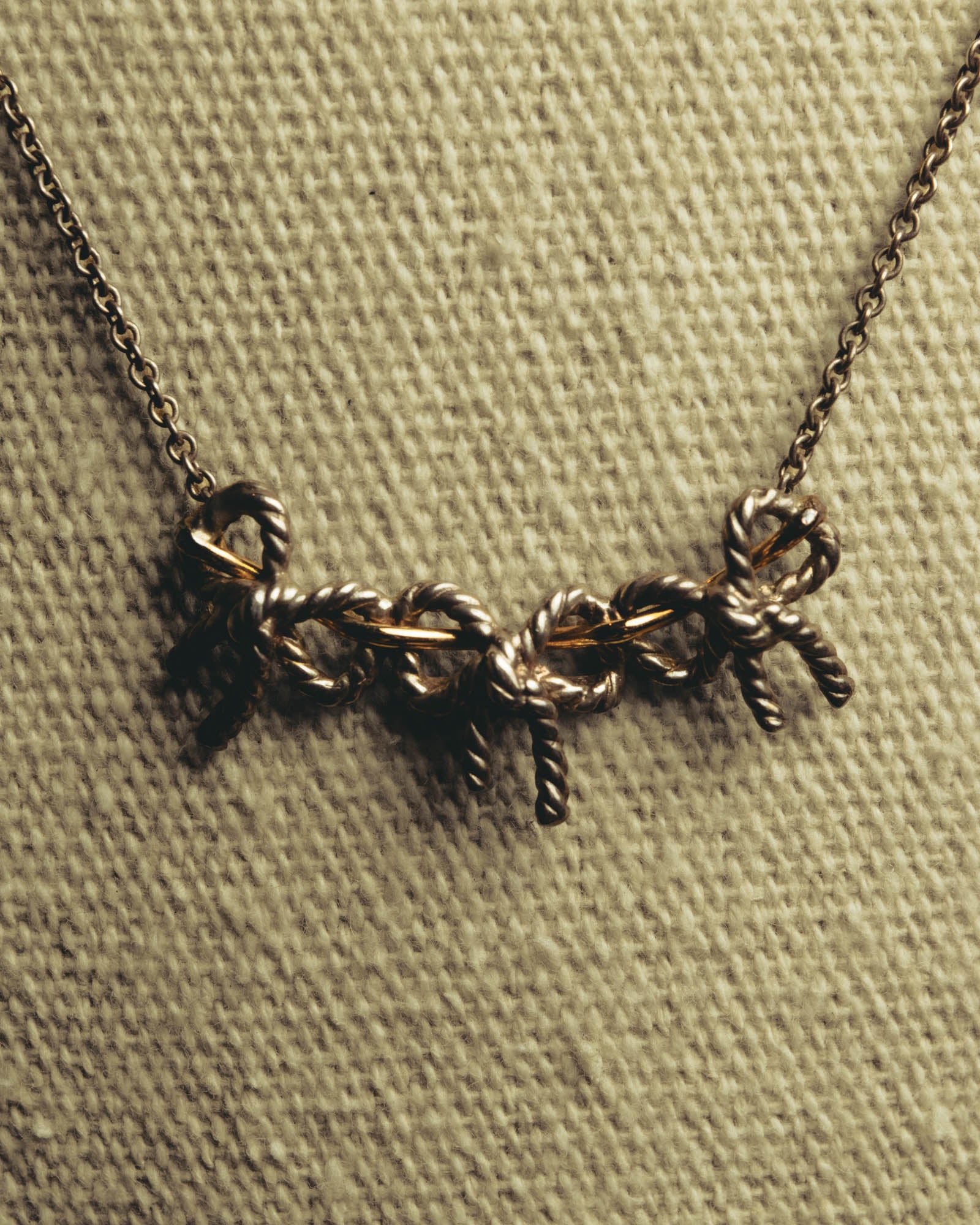 "Tiffany & Co." 80's-90's Sculptural triple bow necklace